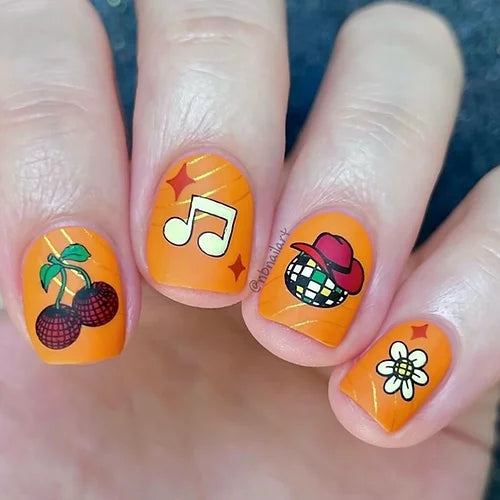 striking-manciure-showing-nail-art-designs-of-a-music-note-disco-cherries-flower-disco-ball