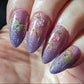 shimmery-ombre-manciure-with-nail-art-designs-of-a-butterfly-and-flowers-with-tassels