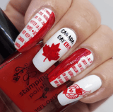 manicure-showing-nail-art-designs-in-red-and-white-of-maple-leaves-canada-flag-and-nail-art-words
