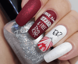 Red-and-white-manicure-showing-nail-art-designs-with-the-words-true-north-strnong-and-free-canada-day-themed