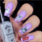 bright-manicure-showing-nail-art-designs-of-dogs