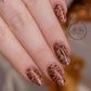 stunning-manicure-with-nail-art-designs-of-a-girl-with-fall-leaves