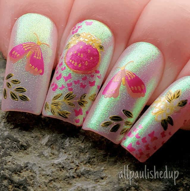 holo-manicure-with-layered-nail-art-designs-of-butterflies-and-leaves