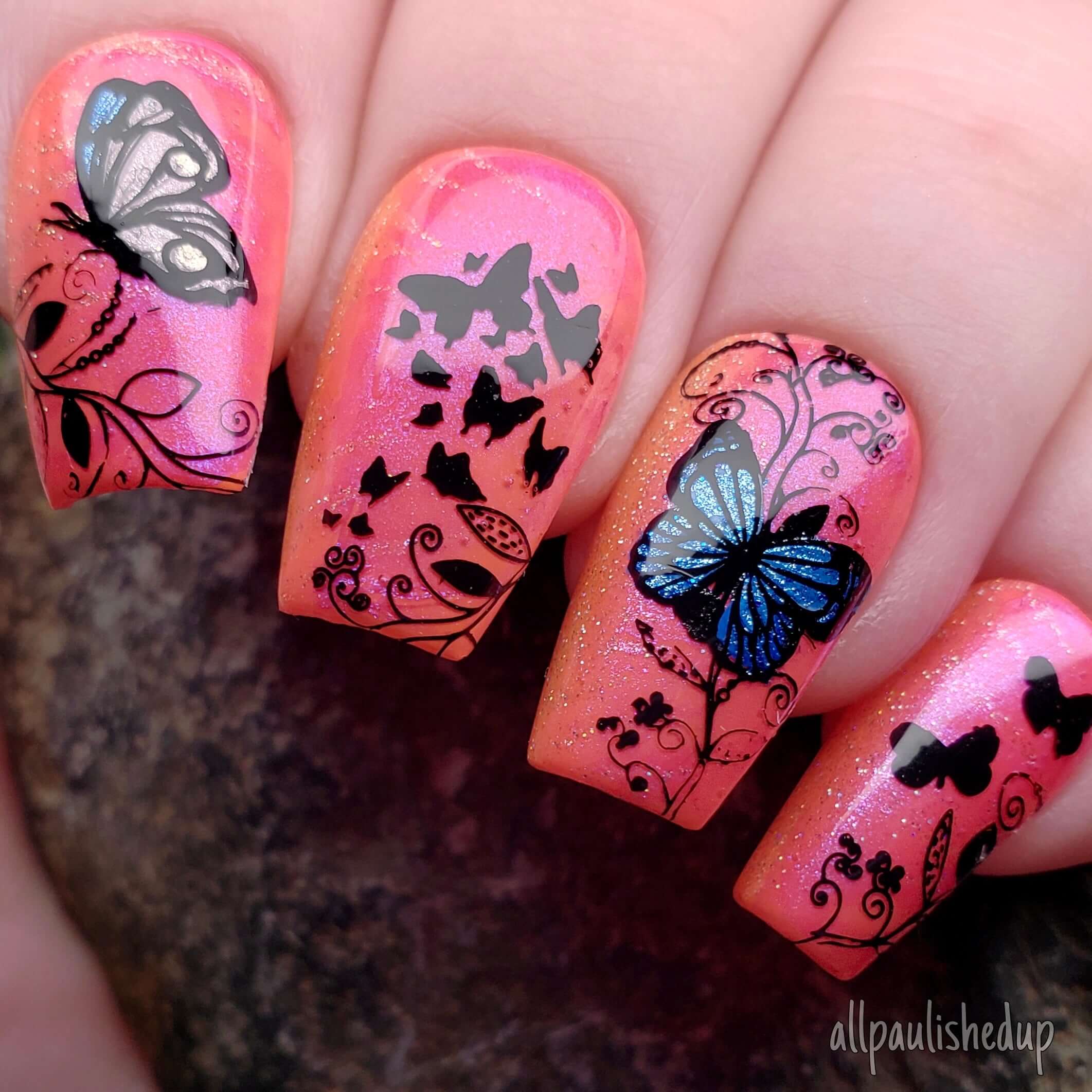 stunning-shimmery-manicure-with-silhouette-nail-art-of-butterflies-and-delicate-vines