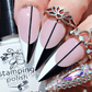 stunning-manicure-showing-geometric-nail-art-french-tip-design-in-black-and-white