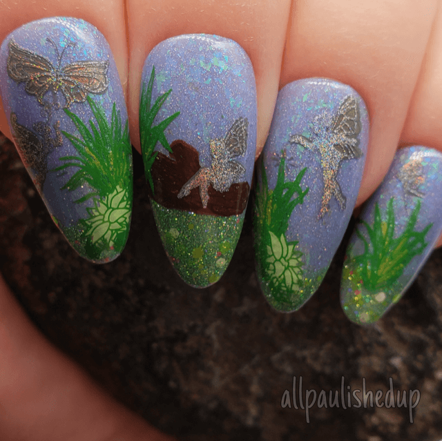 shimmery-manicure-showing-nail-art-designs-of-fairies-in-the-grass