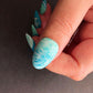 single-manicured-nail-with-stamping-nail-art-full-coverage-designs-of-waves