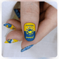 singled-manicured-nail-with-nail-art-design-of-a-sun-and-the-words-sunrise-and-sunset