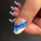 single-manicured-nail-showing-nail-art-designs-of-waves