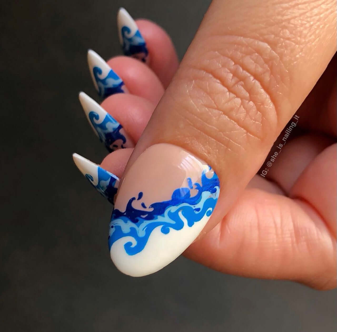 single-manicured-nail-showing-nail-art-designs-of-waves