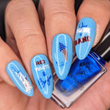 Vivd-blue-manicure-with-nail-art-designs-of-the-statue-of-liberty-and-stars-and-stripes-firework