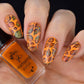 bright-orange-manicure-showing-full-coverage-nail-art-designs-of-leaves