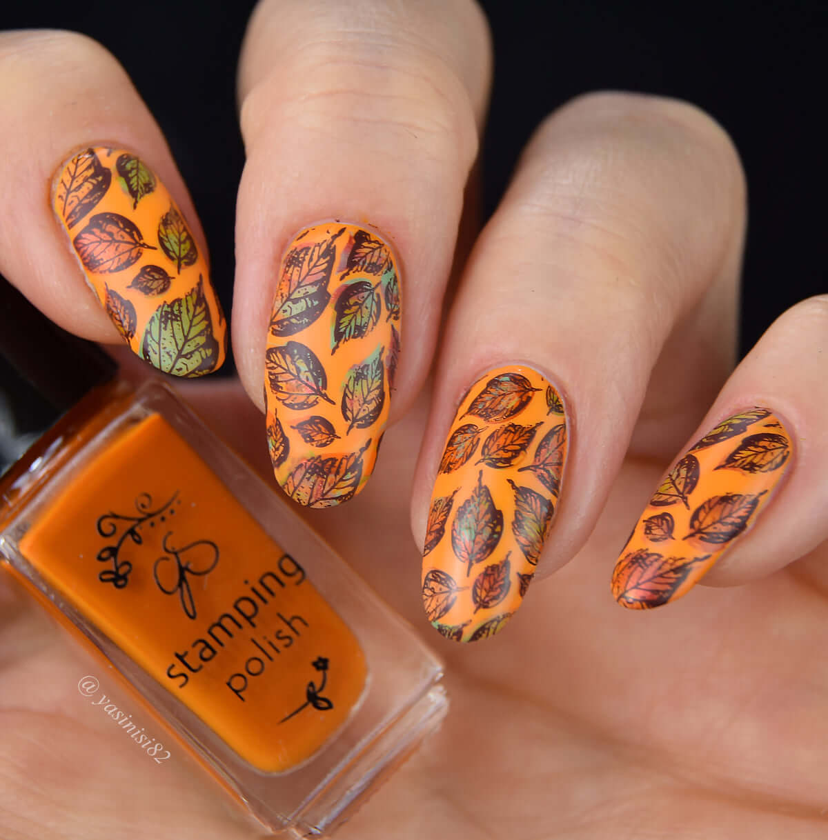 bright-orange-manicure-showing-full-coverage-nail-art-designs-of-leaves
