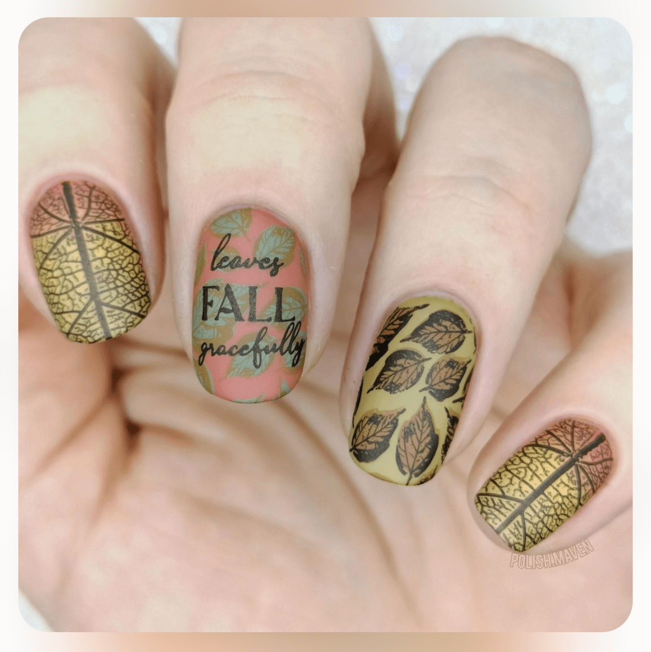 gorgeous-matt-manicure-with-nail-art-designs-of-leaves-and-nail-art-words-leaves-fall-gracefully