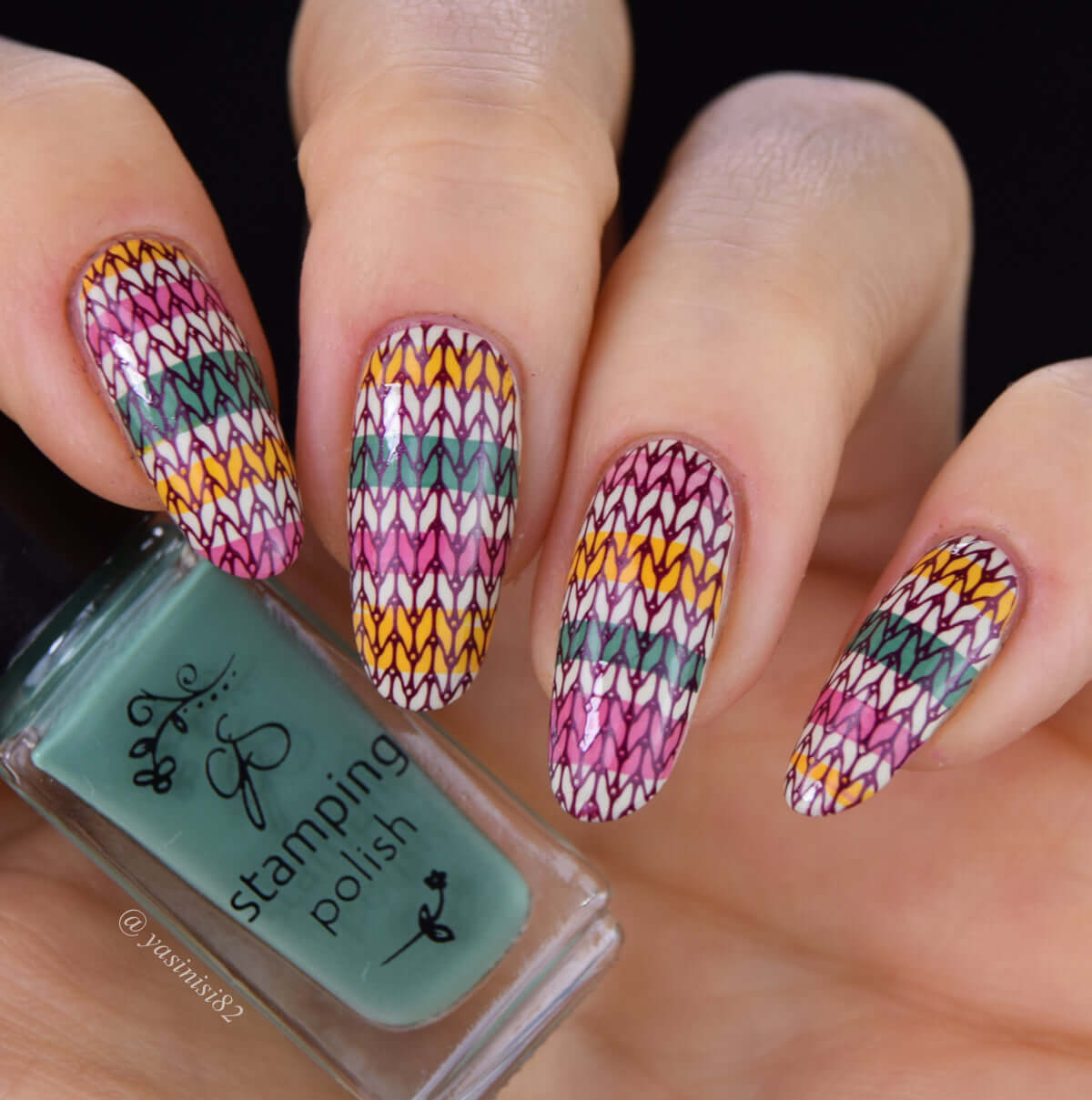 stunning-manicure-showing-full-coverage-nail-art-design-of-a-sweater-pattern