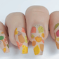 beautiful-matte-manicure-showing-fall-nail-art-designs-of-leaves-pumpkins-and-acorns