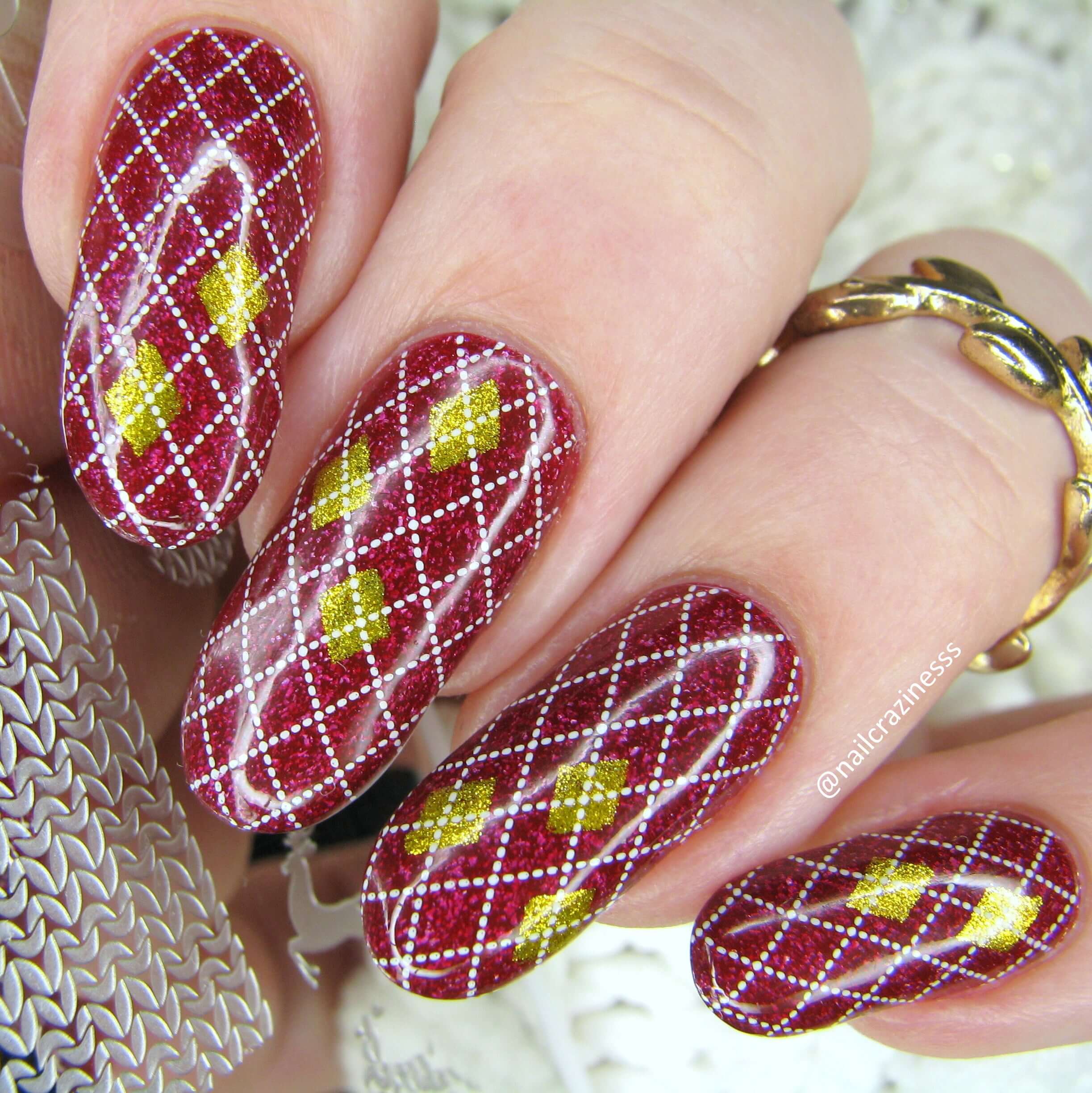 beautiful-manicure-showing-full-coverage-nail-art-design-of-argle-pattern