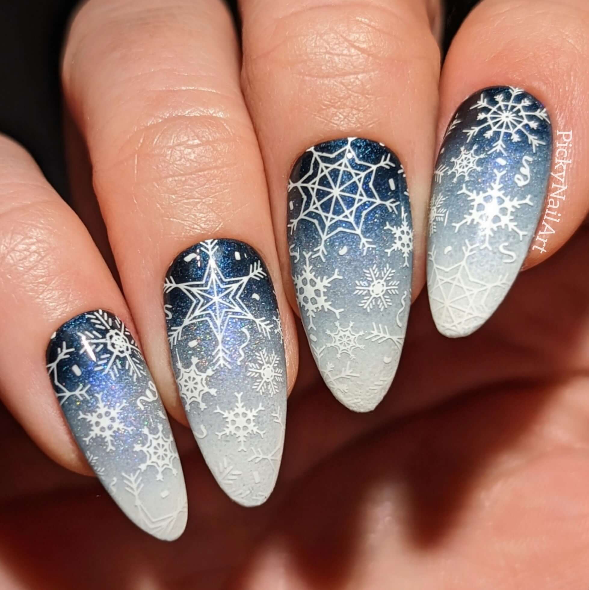 stunning-manicure-showing-full-coverage-nail-art-designs-of-snowflakes
