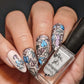Nude-manicure-showing-full-coverage-floral-nail-art-designs-in-shimmery-polish