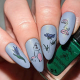 manicure-showing-layered-nail-art-designs-of-modern-abstract-faces-and-flowers