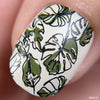 Single-fingernail-showing-layered-nail-art-designs-of-plam-leaves