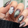 Beautiful-manicure-showing-nail-art-designs-of modern-abstract-leaves