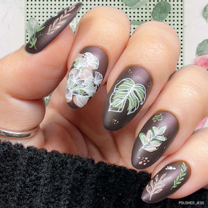 Beautiful-manicure-showing-nail-art-designs-of modern-abstract-leaves