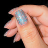 Gorgeous-nail-art-manicure-showing-full-cover-baroque-pattern-in-a-shimmery-blue-color