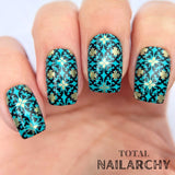 Bright-blue-manicure-showing-beautfiul-baroque-full-coverage-nail-art-designs
