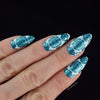 Blue-manicure-showing-nail-art-designs-of-beautfiul-baroque-full-coverage-pattern-