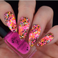 Bright-black-and-pink-manicure-showing-cheetah-print-