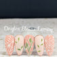 set-of-manicured-nail-tips-with-nail-art-stamping-designs-of-abstract-flowers-and-leaves