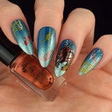 manicure-showing-nail-art-stamping-designs-of-a-dragons-head-and-dragons-flying