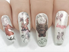 white-manicure-showing-nail-art-designs-of-chinese-dragon-head