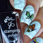 beautiful-manicure-showing-nail-art-designs-of-butterflies-with-a-black-polish
