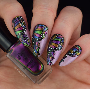  beautiful-manicure-with-nail-art-of-butterfly-wing-designs
