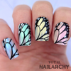 beautiful-manicure-with-nail-art-of-butterfly-wing-designs