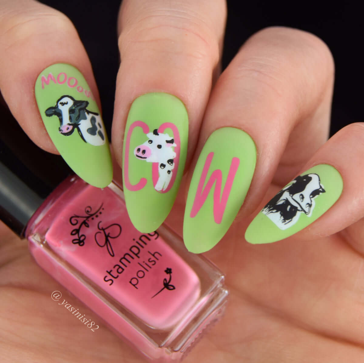 bright-manicure-with-nail-art-designs-of-cow-faces