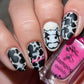 stunning-manicure-with-cow-print-nail-art-designs-and-the-words-mow-bitch