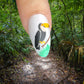 single-manicured-nail-showing-a-layered-nail-art-design-of-a-toucan