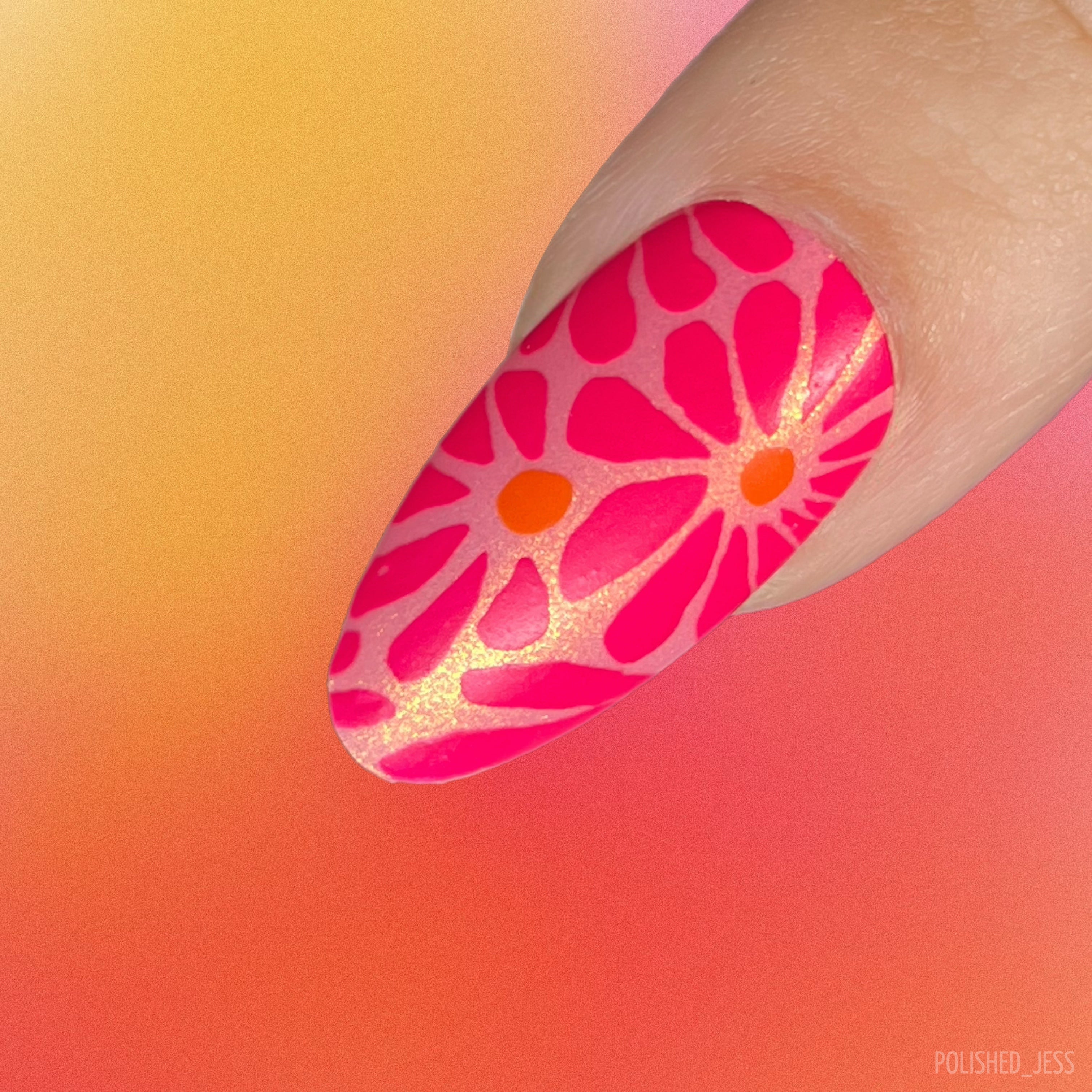 single-manicured-nail-with-abstract-nail-art-stamping-design-of-flowers