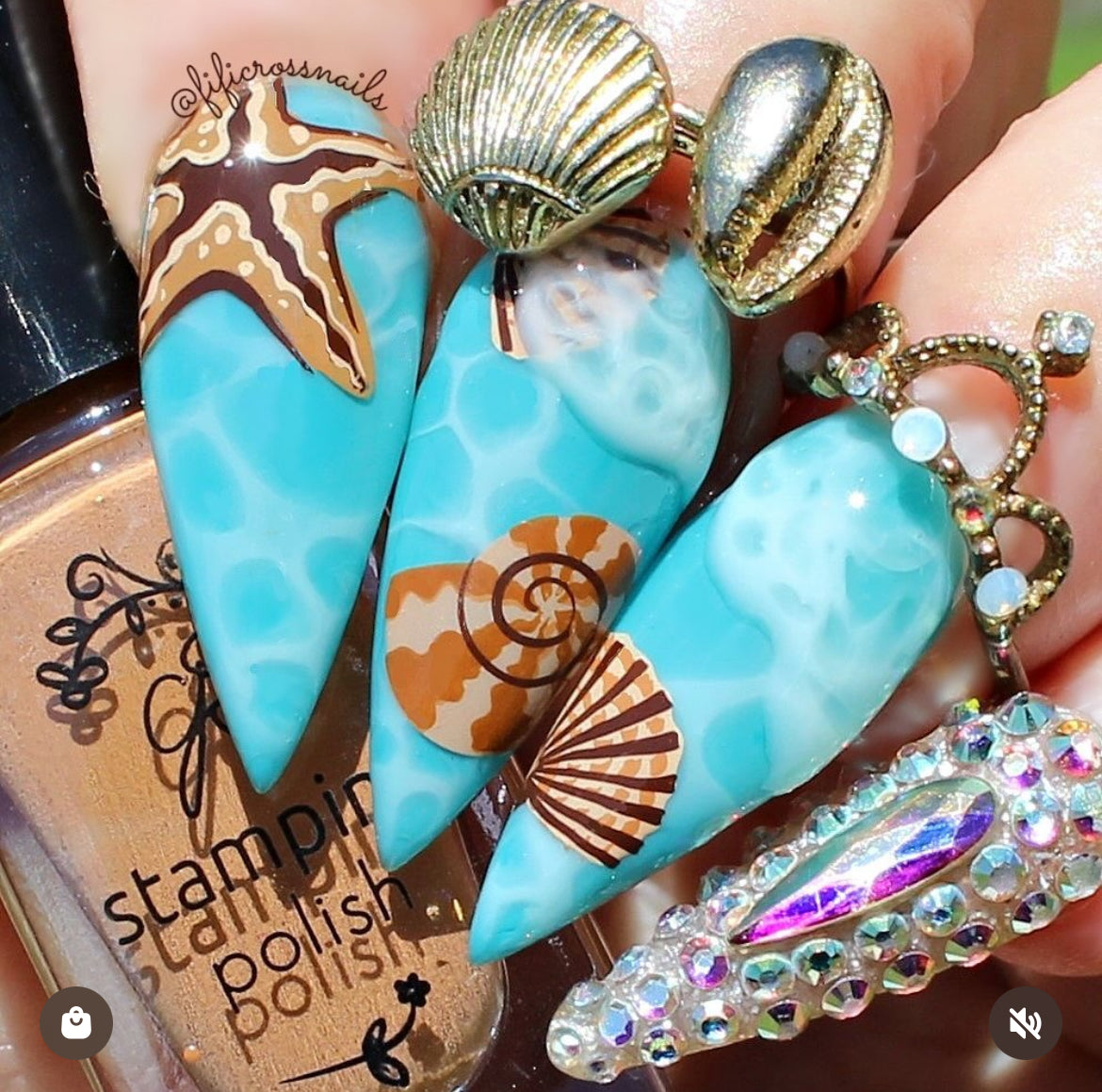 stunning-manicure-showing-layered-nail-art-designs-of-seashells