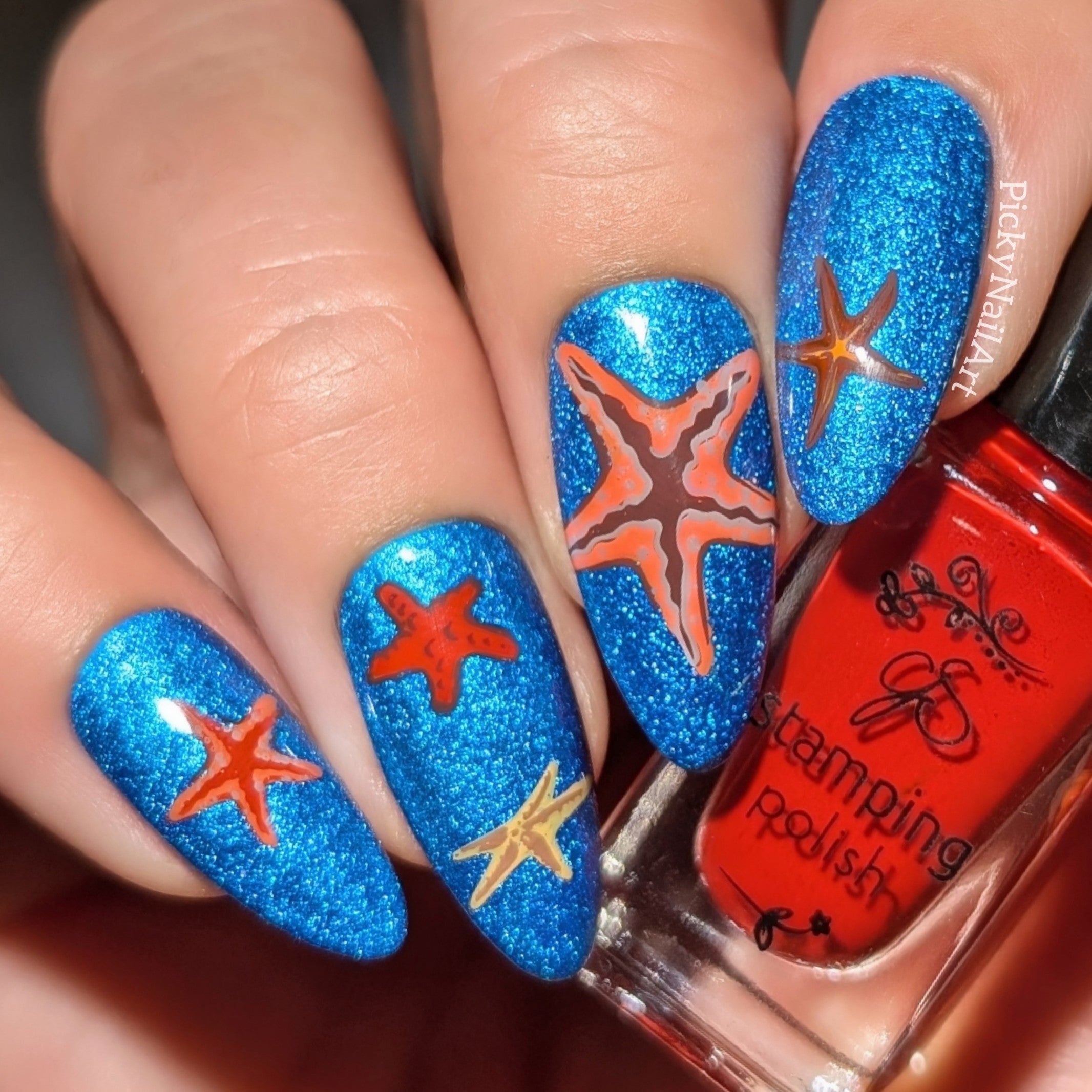 stunning-shimmery-manicure-with-nail-art-designs-of-starfish