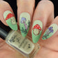 beautiful-manicure-with-red-and-white-mushrooms-and-green-leaves