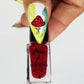 single-manicured-thumb-nail-with-stunning-nail-art-design-of-a-toadstool