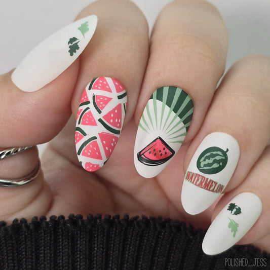 Nail art with watermelon designs on a white background