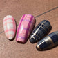 set-of-manicured-nail-tips-with-plaid-nail-art-designs
