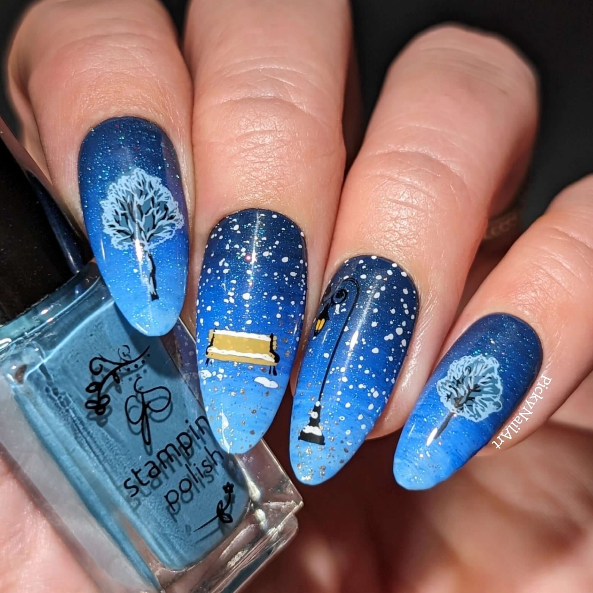 stunning-manciure-with-a-winter-nail-art-scene-of-snow-falling-on-a-lampost-bench-and-trees