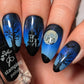stunning-manicure-with-a-nail-art-halloween-scene-of-a-haunted-house-trees-bats-full-moon