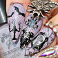 stunning-manicure-with-nail-art-designs-of-a-skeleton-couple-with-chandelier-mirror-bats